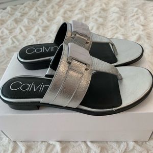 1 pair of Calvin Klein sandals. Like new. Worn 1x.